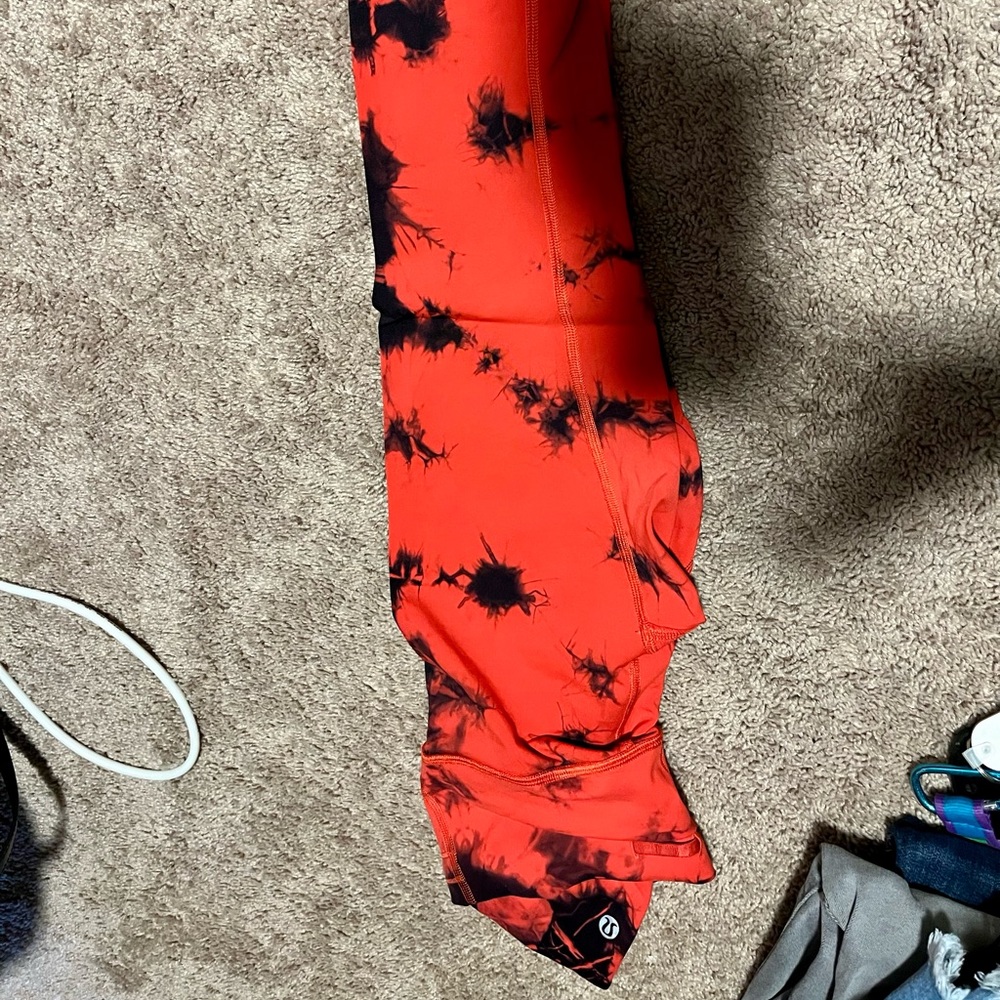 Black and red wonder under Lululemon leggings. Like new